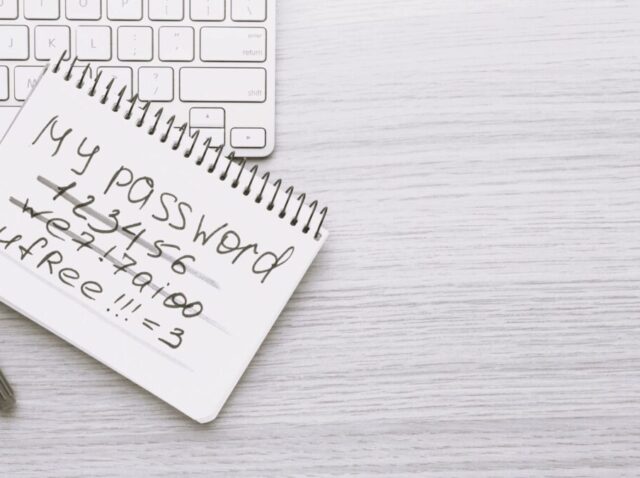 flat-lay-keyboard-with-copy-space-notebook-with-password-scaled-e1717685588580